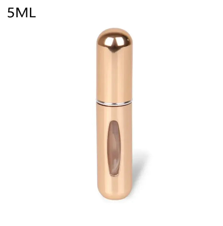 Gold 5ml refillable perfume atomizer bottle for travel, compact design with clear window for easy viewing.