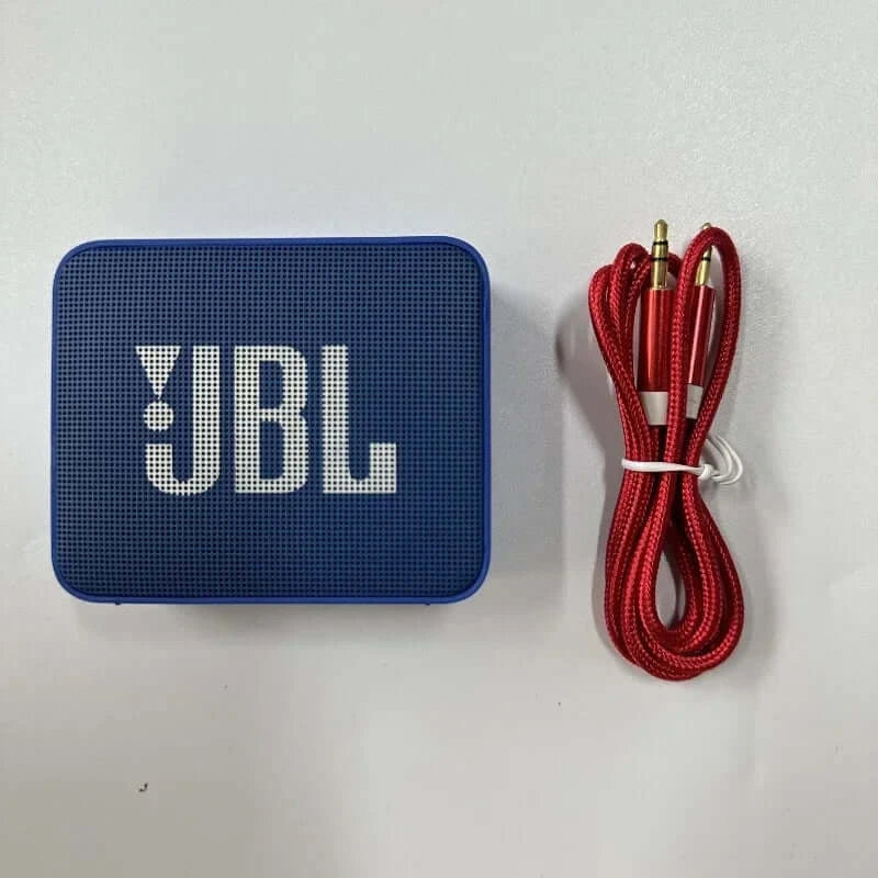 Blue JBL GO 2 Bluetooth speaker with red audio cable on a white background.