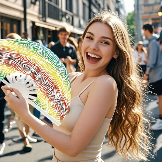 Woman enjoying outdoor party with chic zebra print rainbow folding fan, perfect handheld accessory for events and dance.