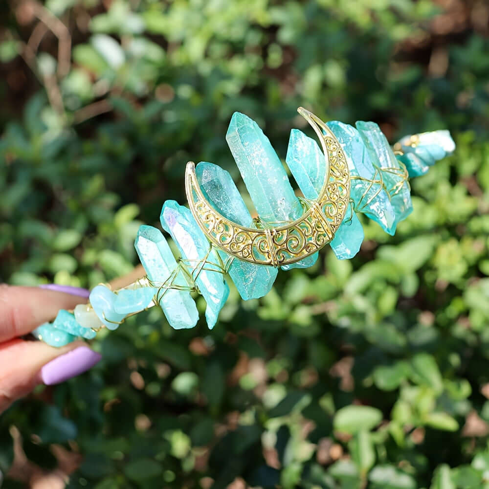 Elegant natural crystal headband with moon-shaped hollow design, perfect for weddings and special occasions, shown in vibrant greenery.