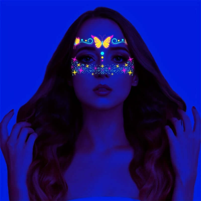 Neon butterfly face stickers glowing under UV light, perfect for festivals and parties. Bright, waterproof design for standout makeup.