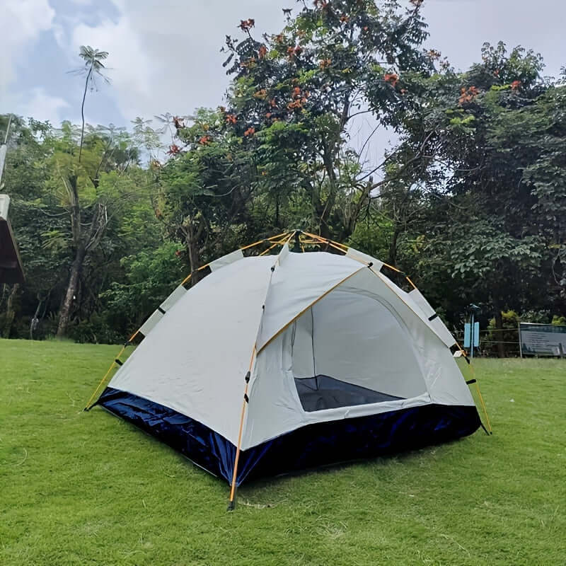 Waterproof camping tent with automatic setup, UV protection, and carbon-fiber poles for 3-4 people in a grassy outdoor setting.