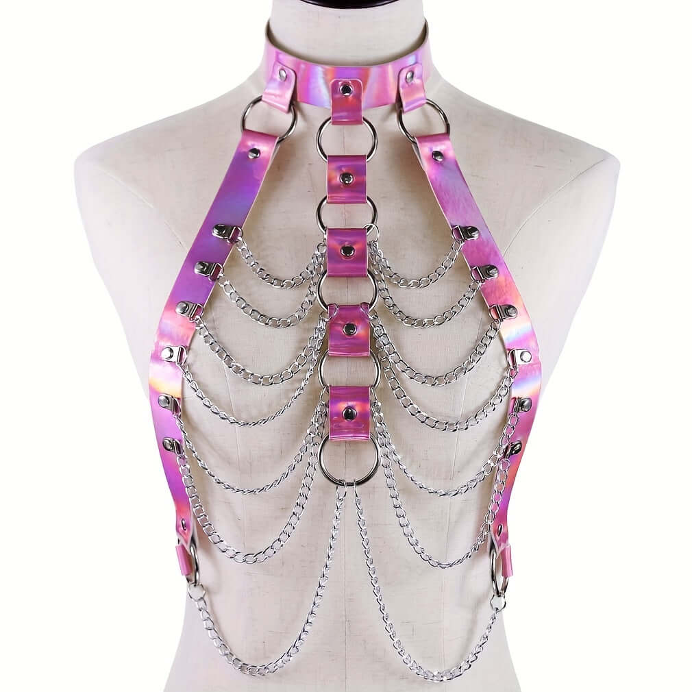 Pink laser PU leather harness with multilayer chains, perfect for music festivals and parties, displayed on a mannequin.